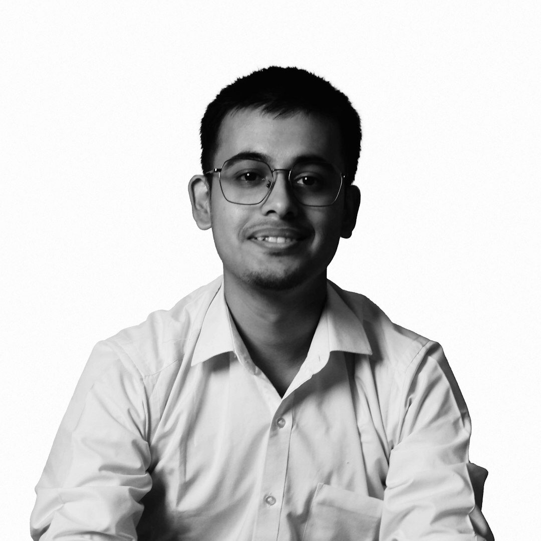 Studio portrait of a young technical director smiling